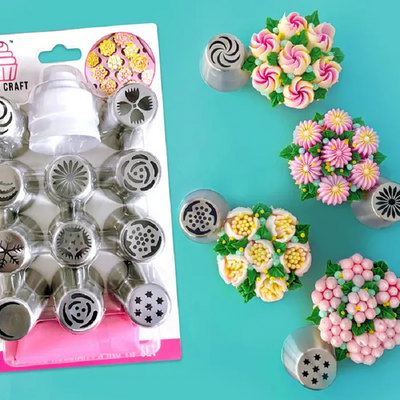 Colection of Russian piping tip nozzles with iced cupcakes with colourful buttercream icing flowers