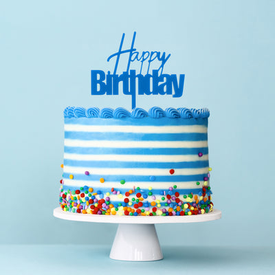 Fun Font CAKE TOPPER HAPPY BIRTHDAY Blue on display cake
