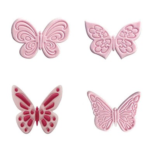4 fondant pink icing butterflies