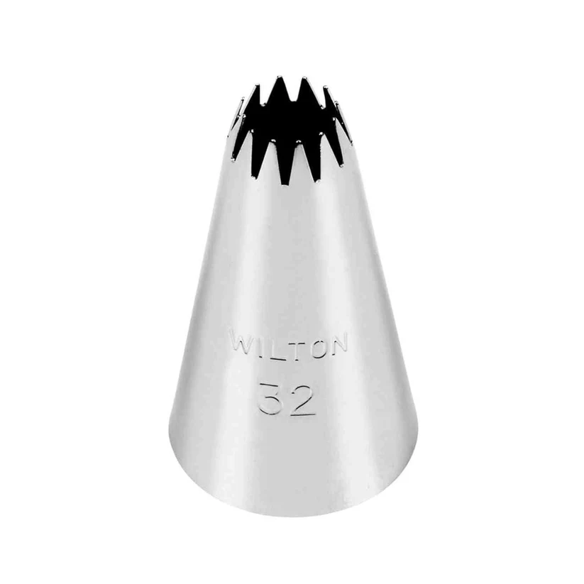 A Wilton 32 metal piping tip with a multi-spike star pattern, shown on a plain white background.