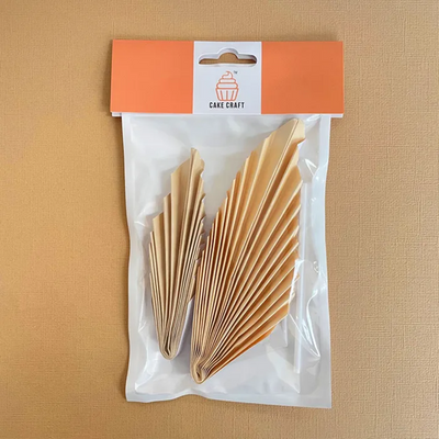 Paper palm leaf fan decorative cake topper 2 per pack Cream