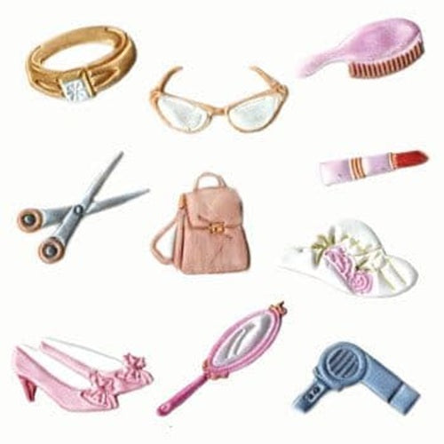 A collection of fondant and gumpaste cutters in the shapes of various ladies' accessories, including a ring, hair brush, lip stick, hair dryer, scissors, shoes, hand mirror, sunglasses, hand bag, and summer hat.