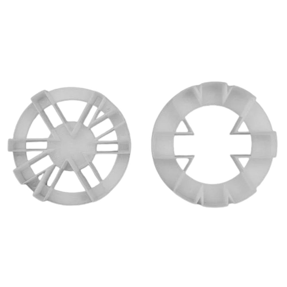 Two gray plastic rings with a star-like pattern on a white background made to form a union jack when placed together