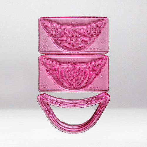 2 plastic embosser in a lace design with a matching cutter to create drapes and swags