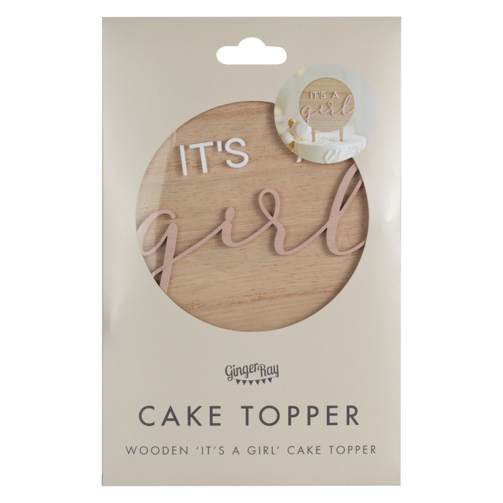 Wooden 'It's a Girl' cake topper in packaging