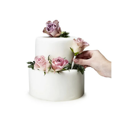 examples of flower picks on use in a cake