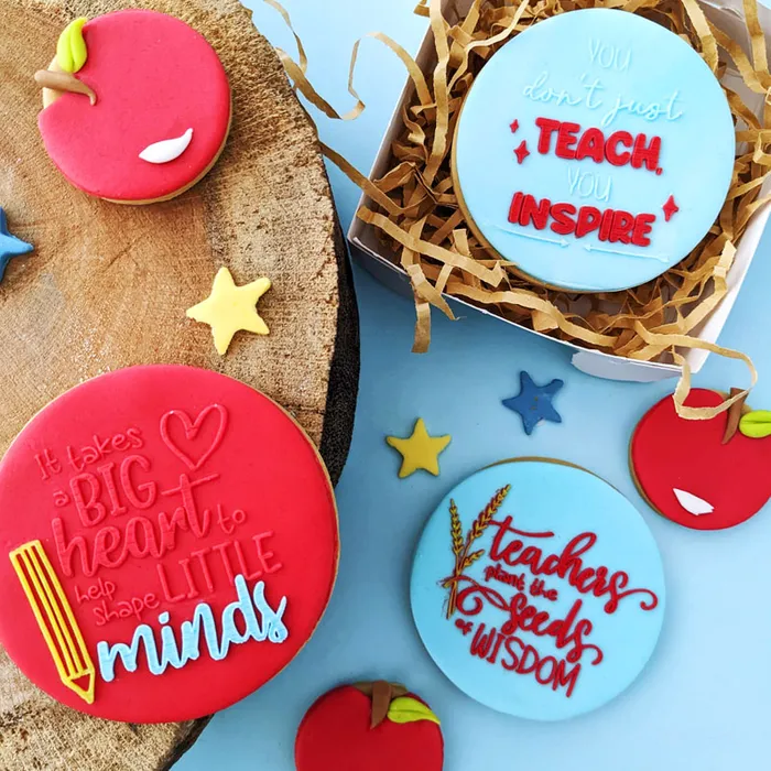 Inspirational messages for teachers, on top of fondant cookies