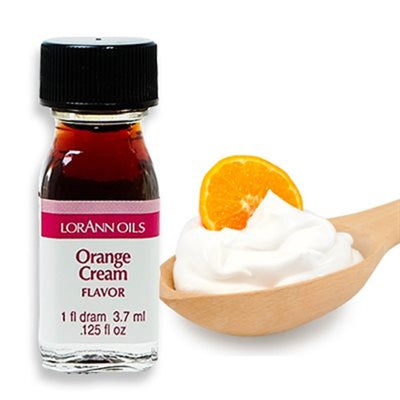 A small bottle labeled 'LorAnn Oils Orange Cream Flavor' alongside a wooden spoon with a dollop of cream and a small piece of orange.