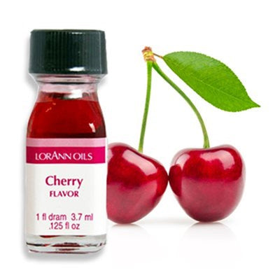 A small bottle labeled 'LorAnn Oils Cherry Flavor' next to two cherries with a green leaf.