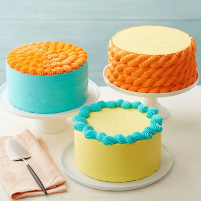 Decorated cakes using tip 4B, piped rope and shells