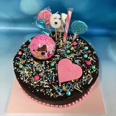 Custom decorated round cake in store pick LOL Surprise doll ball