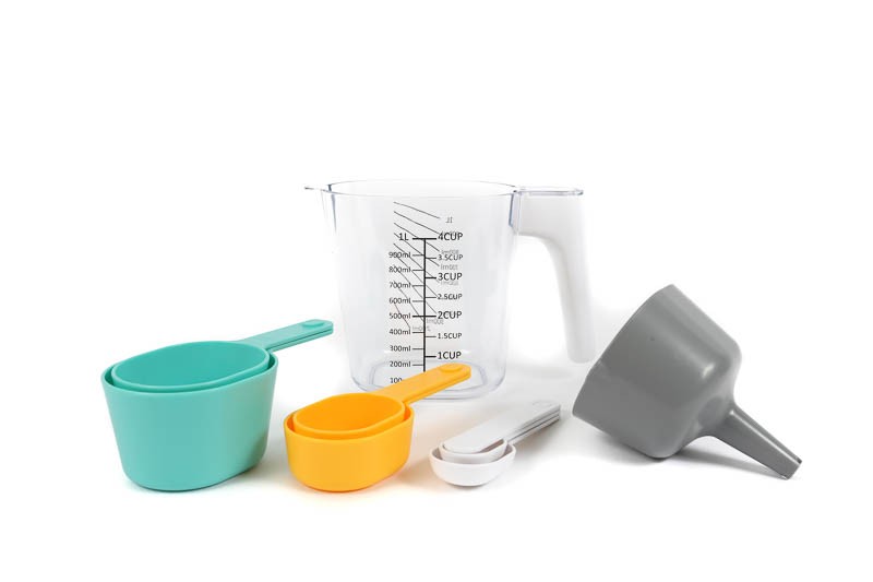 Measuring Jug with nesting measure cups spoons funnel and scraper