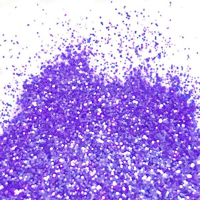 A close-up image of lavender purple flitter glitter spread on a white background.