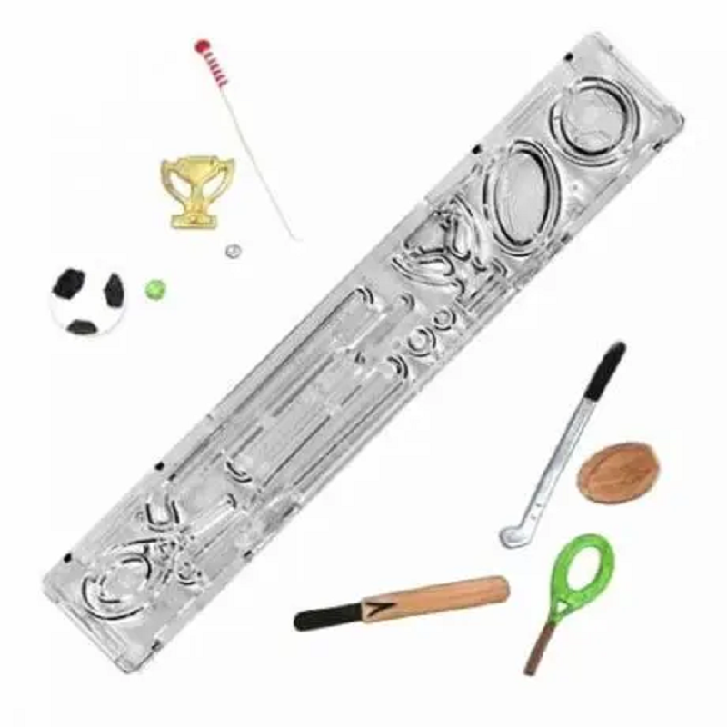 A sports-themed multi cutter made by Windsor Cake Craft UK, including shapes of a cricket bat, football, golf club, baseball bat, racket, rugby ball, and trophy.