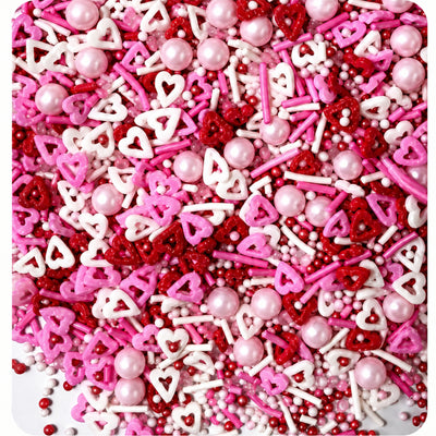 Heart shaped sprinkles, with pink sugar pearls and white and pink jimmies
