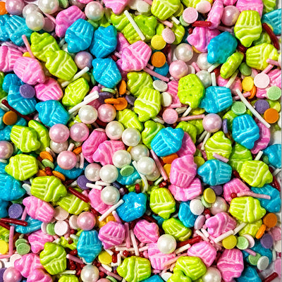 Bright Cupcake Sprinkle Mix with colourful cupcake-shaped sprinkles, shimmering pearls, rods and confetti in bright pink, blue, lime green and rainbow hues.