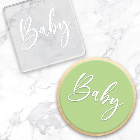 Baby fondant debosser embossing tool with an example of a sage green cookie