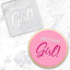 Pink cookie with 'Birthday Girl!' text on a marble surface. With clear acrylic debosser tool used to make it