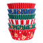 Stack of colorful PME cupcake liners with Christmas designs on a white background