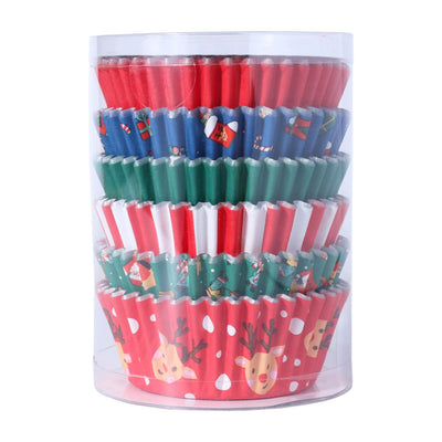 Stack of colorful cupcake liners with Christmas designs in a clear cylindrical container.