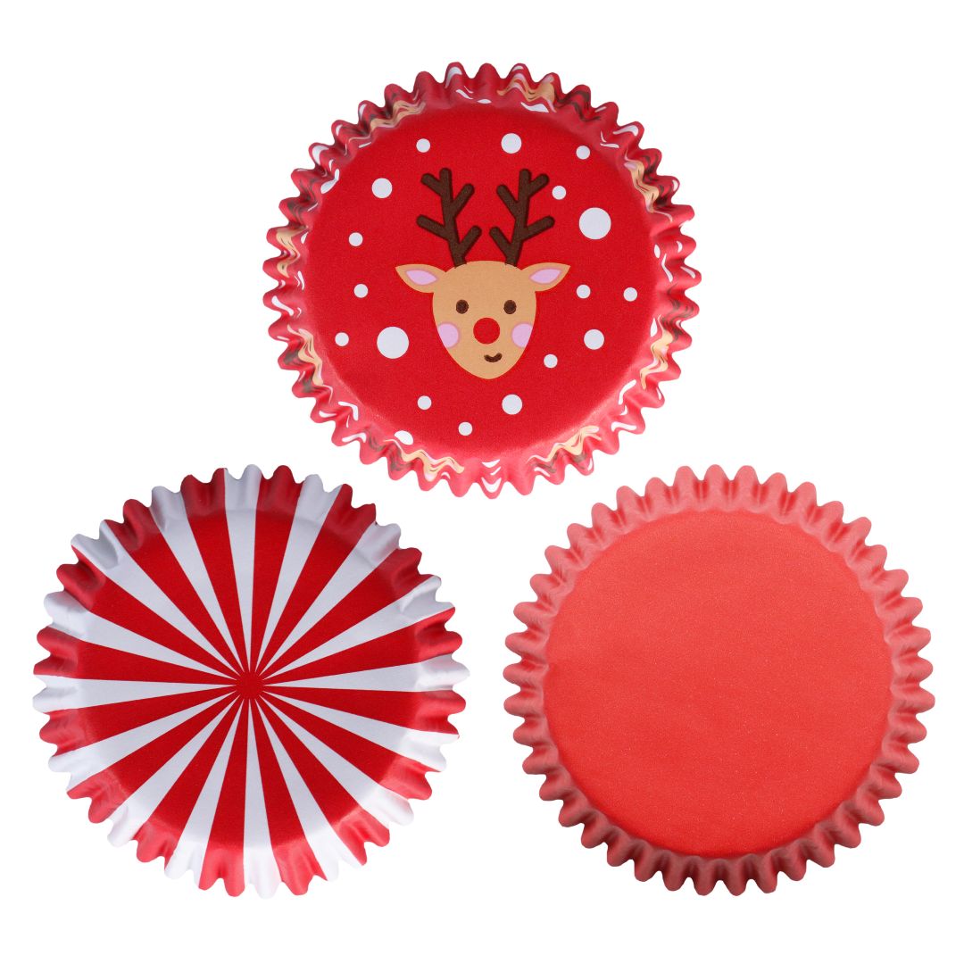 Three red cupcake liners with different Christmas themed designs on a white background