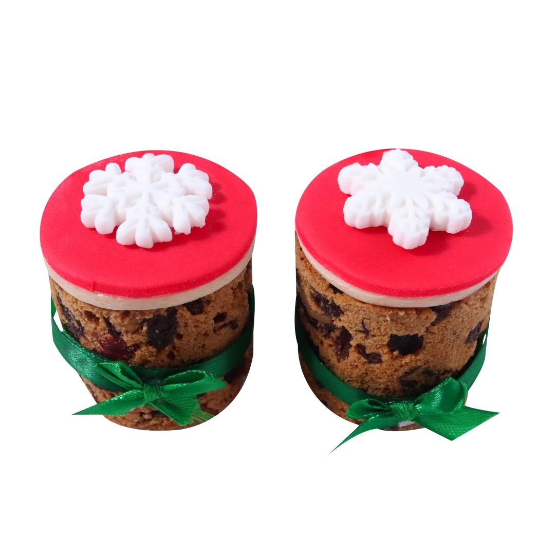 mini Christmas Cakes adorned with White Snowflakes