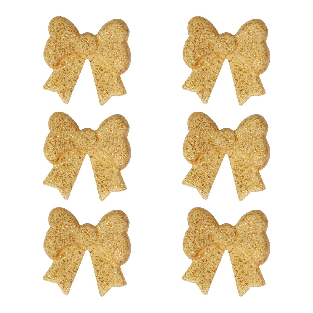 Gold glittery bow-shaped icing decorations