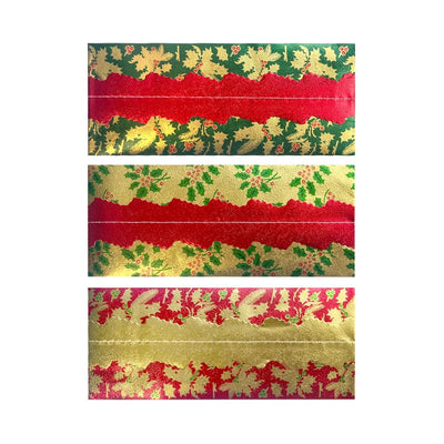 Three styles of Christmas cake frills stacked vertically on a white background, each showing a festive pattern with a wide red band, a gold background, and green holly leaves with small pink berries.
