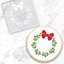 Christmas wreath acrylic debosser with an example of a finished cookie using it