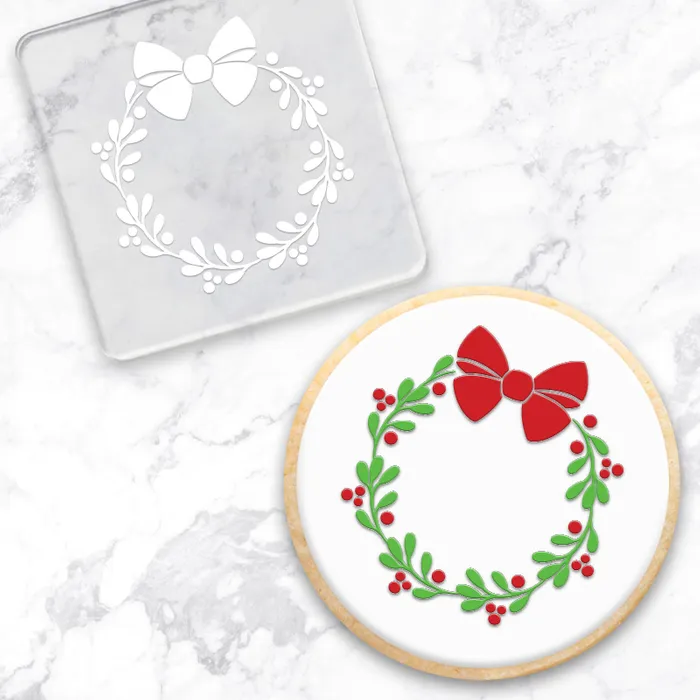 Christmas wreath acrylic debosser with an example of a finished cookie using it