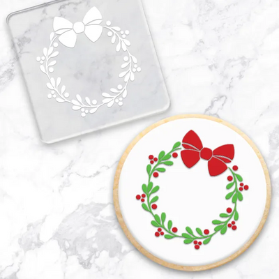 Christmas wreath acrylic debosser with an example of a finished cookie using it