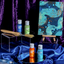 Art supplies including bottles of edible Colour Mill paint and a brush on a reflective surface with a purple curtain background.