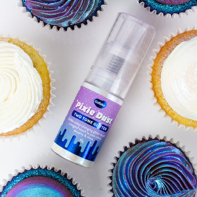 Pixie Dust Two Tone Glitter spray bottle with cupcakes decorated with glitter icing.