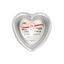 A heart-shaped aluminum cake pan by Fat Daddio's, featuring a silver metallic finish and a central paper label with product information.