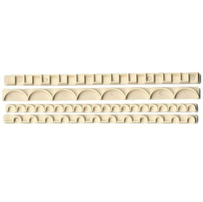 Three long cream-colored plastic trim pieces with repeating arch and rectangular patterns, shown horizontally on a plain white background.