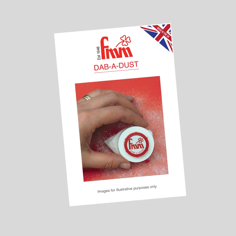 A printed card or booklet cover for Fmm DAB-A-DUST, shown at a slight angle on a light gray background. The card features the Fmm logo, a small Union Jack corner badge, and a central photo of a hand pressing a white DAB stick into red powder.