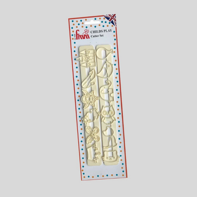 A boxed children'sset featuring pale cream-colored plastic fmm fondant cutters with shapes like a teapot, mug, cup, flower, and animal, presented on a white card with red and blue dotted borders. The package shows the brand name 'Fmm' at the top.