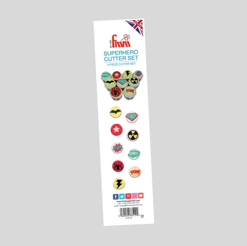 A package of 2-piece superhero cutters by Fmm, featuring a white backing card with colorful pictures of circular cutters displaying various comic book characters, shown against a solid gray background.