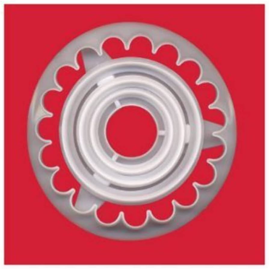 A set of white plastic frill cutters by FMM sugarcraft