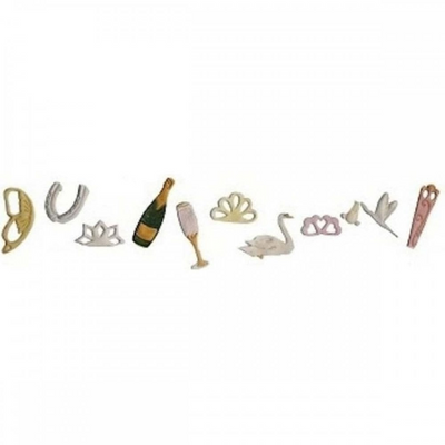 A row of small decorative gumpaste icing decorations shaped like horseshoe, crown, champagne bottle, flute, swan, rings, birds, and a pink object, arranged on a plain white background.
