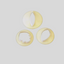 Three pale yellow plastic flower petal cutters in different shapes, arranged on a light gray background.