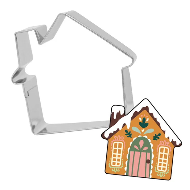 House-shaped cookie cutter with a gingerbread house design on a white background