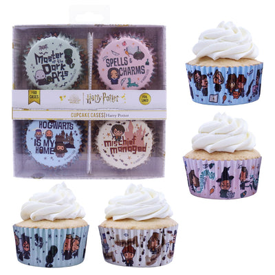 Set of Harry Potter-themed cupcakes with decorative cupcake cases on a white background