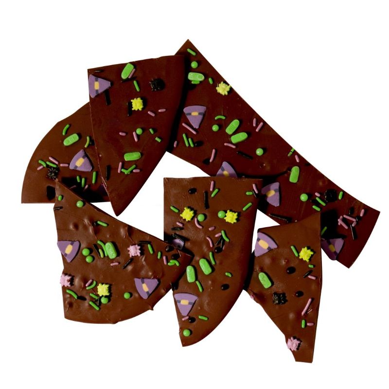 Chocolate bark with colorful Halloween sprinkles on a white background