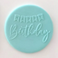  a fondant plaque in blue featuring a happy birthday design