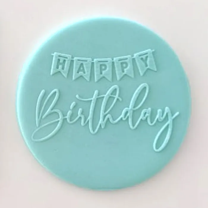  a fondant plaque in blue featuring a happy birthday design