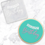 Clear acrylic debosser with Happy Birthday banner. Alongside a finished cookie showcasing the design