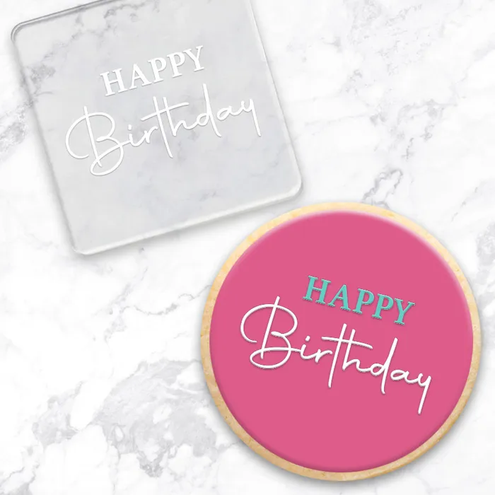 Happy birthday clear debosser. Alongside a finished pink cookie, showcasing the design