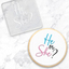 He or She gender reveal cookie. Sitting alongside the clear acrylic debosser used to make it