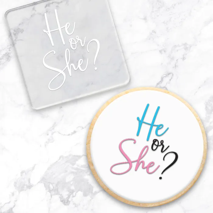 He or She gender reveal cookie. Sitting alongside the clear acrylic debosser used to make it
